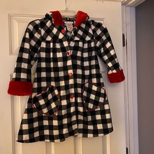 Black and white check coat with red faux trim